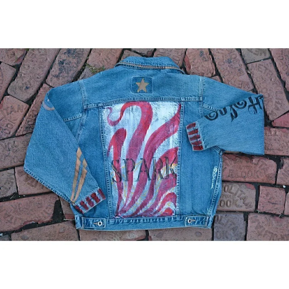 Vintage faded denim classic jean jacket. Retro cut with hand painted images